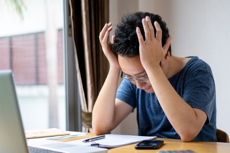 Ilustrasi stres ketika WFH di masa pandemi. Sumber: Shutterstock/Chayatorn Laorattanavech via Kompas.com
